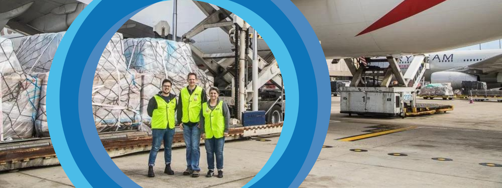 ICE team overseeing air freight cargo loading at an airport, showcasing secure and reliable freight forwarding services to Australia.